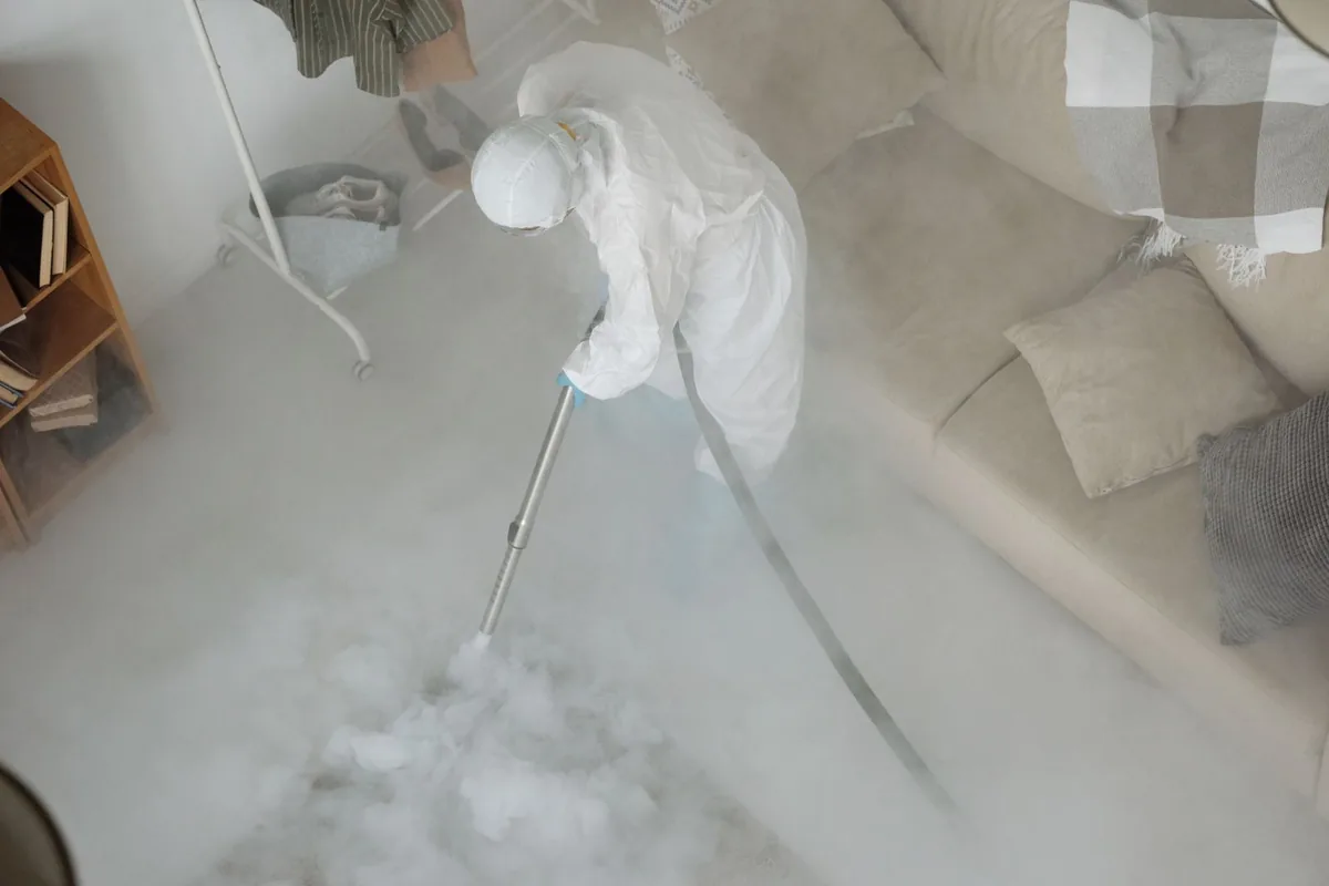 Biohazard cleanup technician in protective equipment, Laguna Woods, CA